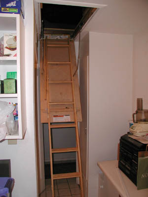 Attic stairs and water heater enclosure